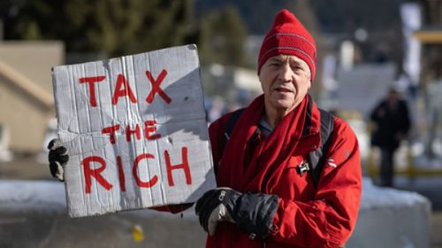 Millonarios piden en el Foro de Davos pagar más impuestos