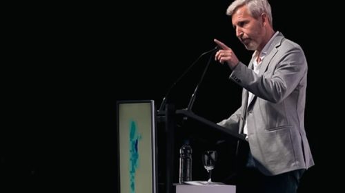 Frigerio prometió a los industriales sancionar una ley que ya está vigente